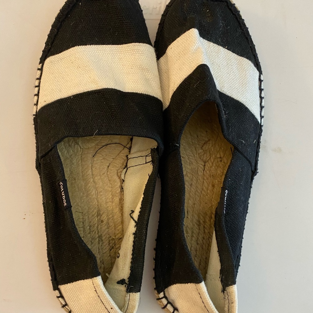 Black and white striped espadrille flats